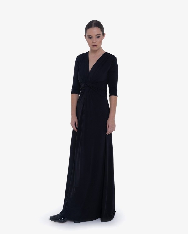 Cuplé MAXI VESTIDO NEGRODE PUNTO CON NUDO FRONTAL Y MANGAS TRES CUARTOS Tienda de fábrica