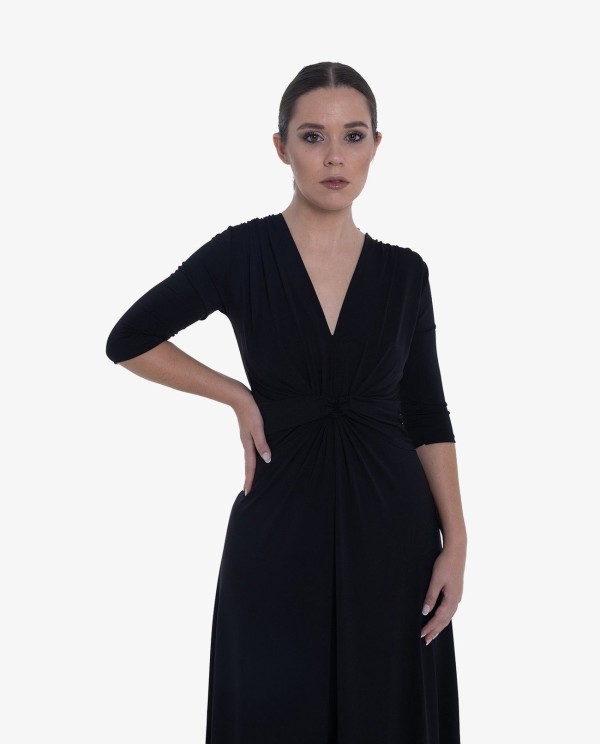 Cuplé MAXI VESTIDO NEGRODE PUNTO CON NUDO FRONTAL Y MANGAS TRES CUARTOS Tienda de fábrica
