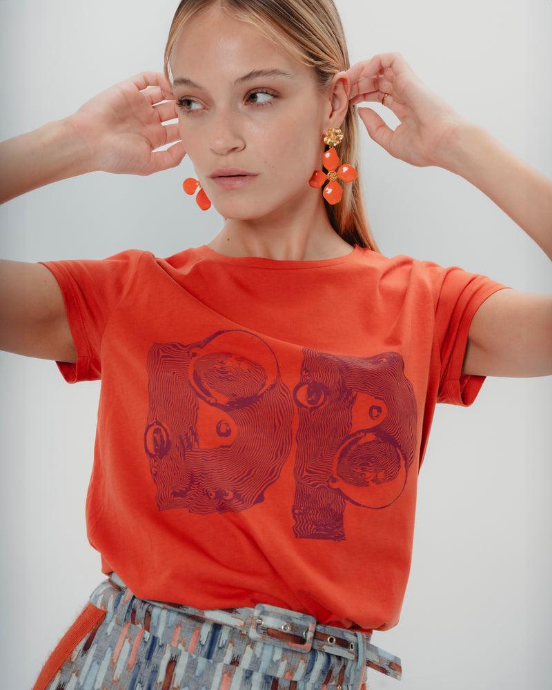 Dolores promesas Camiseta Naranja Vibrante