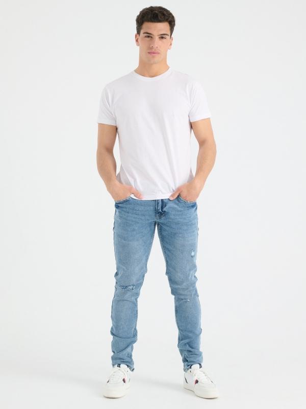 In side Jeans slim azul rotos
