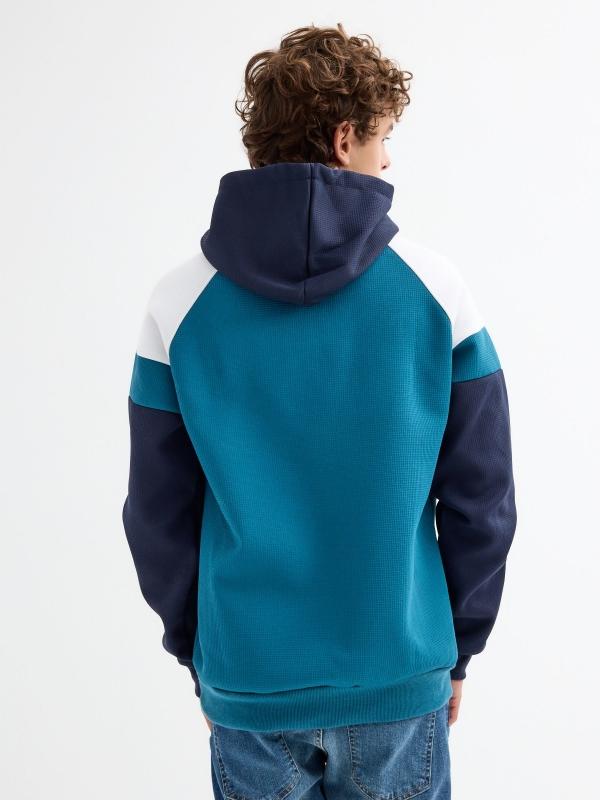 In side Sudadera texto color block Tienda