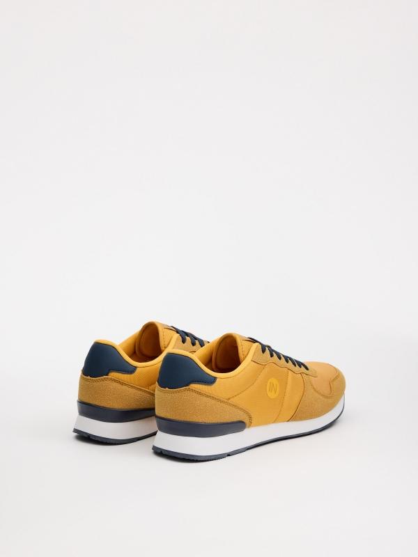In side Zapatillas bajas casual mostaza Devoluciones gratuitas