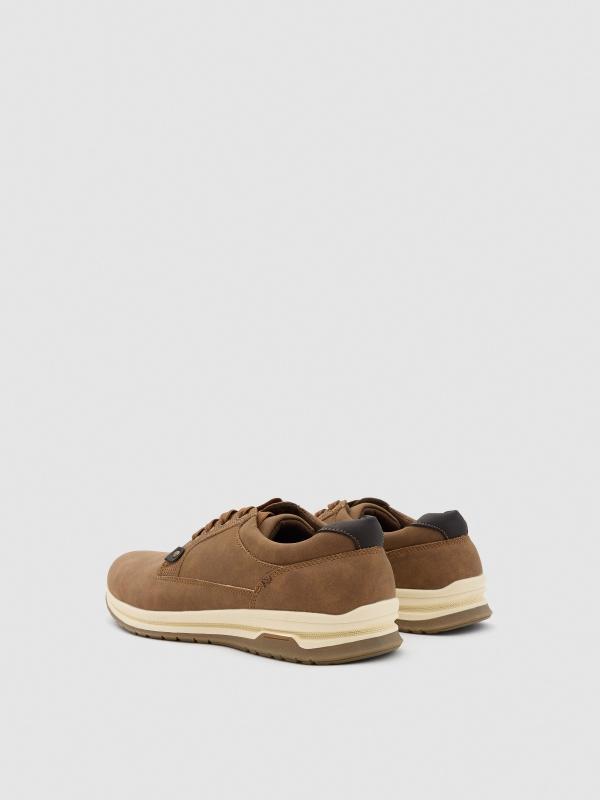 In side Zapato deportivo marrón Venta caliente