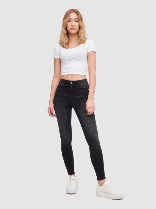 In side Jeans skinny tiro medio