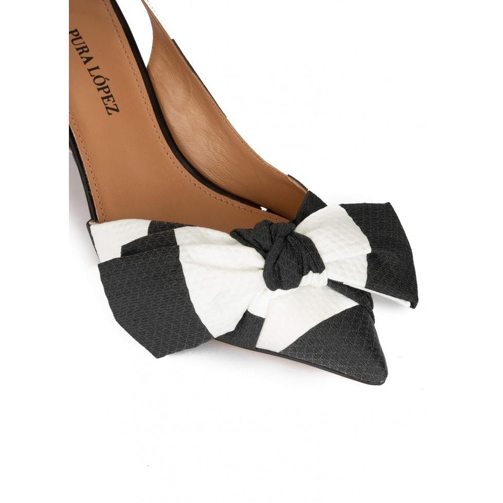 pura lópez Zapatos de punta fina y tacón medio en blanco y negro con lazo Solo queda un día