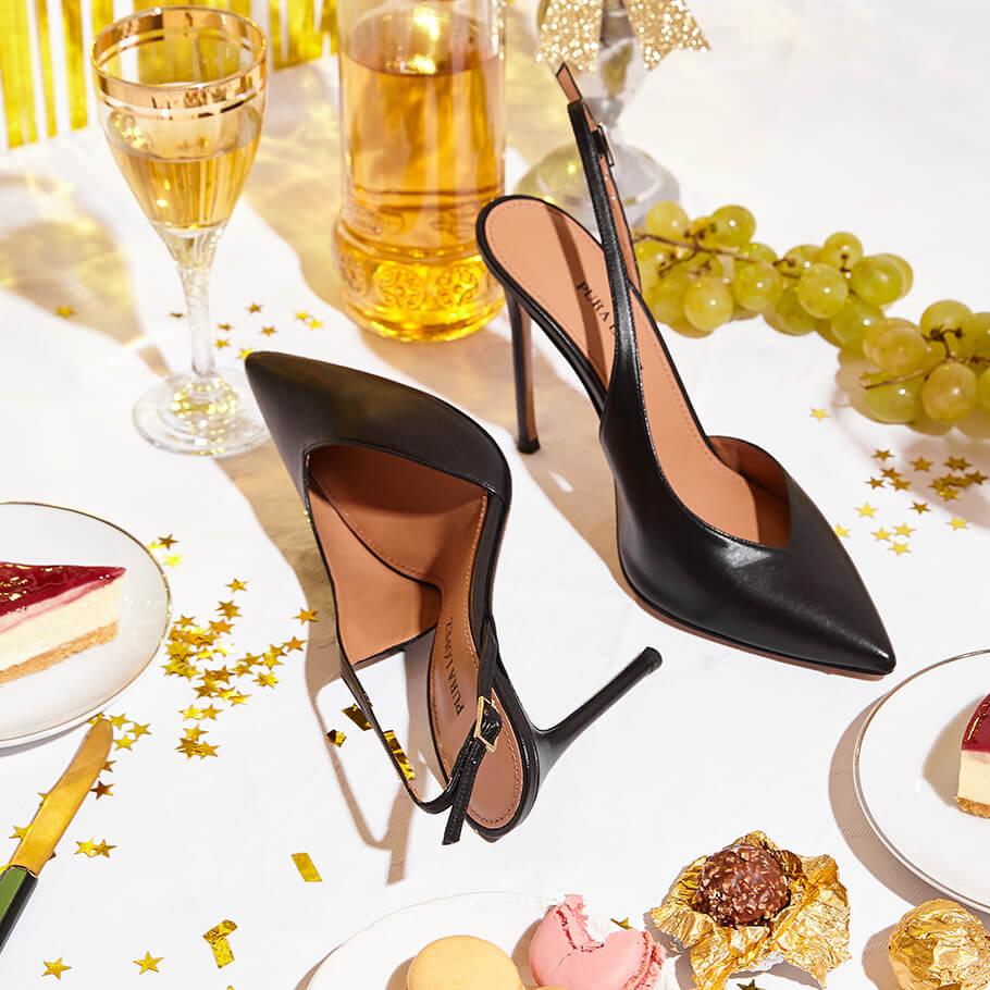 pura lópez Slingbacks de tacón alto con escote asimétrico en piel color negro 2025