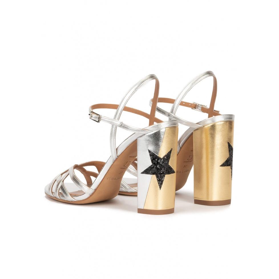 pura lópez Sandalias metalizadas de tacón ancho con detalle de estrella En oferta