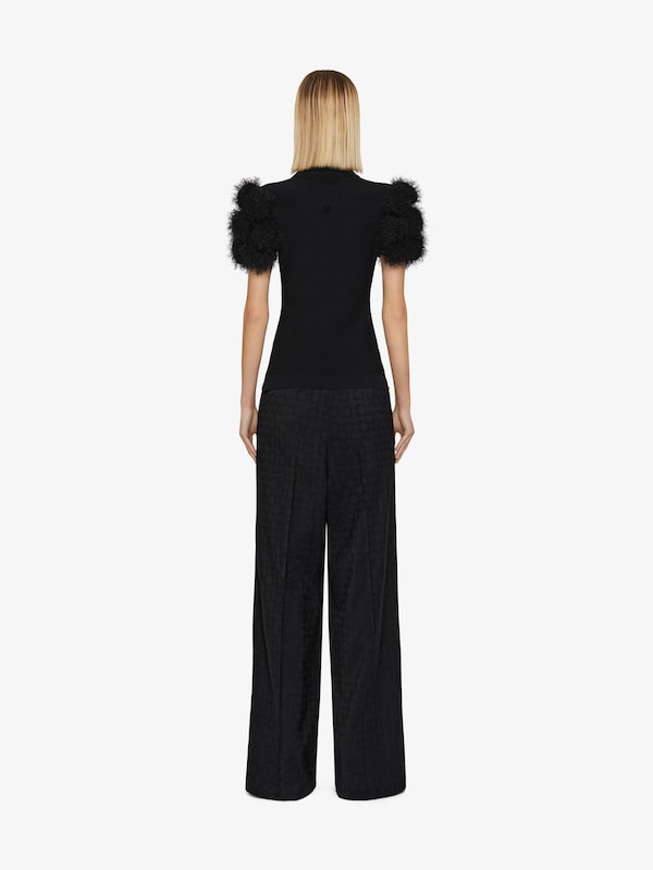 Givenchy Slim fit polo in knit with pompoms Oferta especial