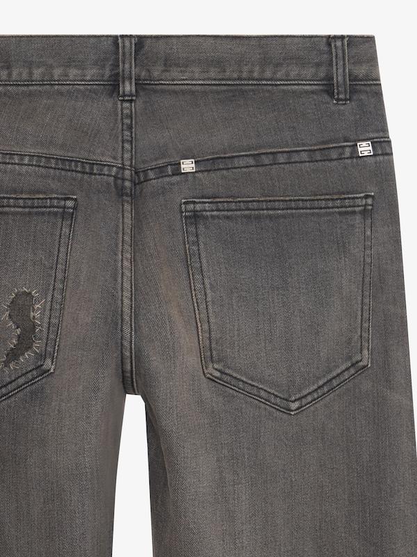 Givenchy Straight fit jeans in vintage destroyed denim Liquidación