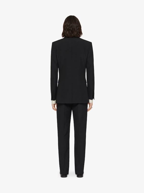 Givenchy Slim fit tailored pants in wool with 2G clip Envío gratis