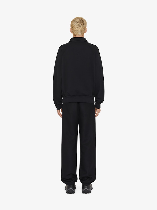 Givenchy Polo sweatshirt in fleece with GIVENCHY medallion Envío internacional gratuito